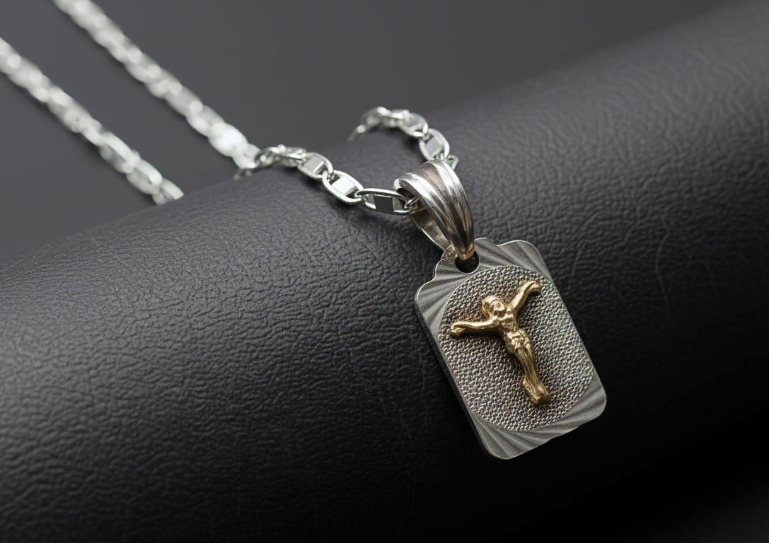 Cadena escalera con medallón de Cristo